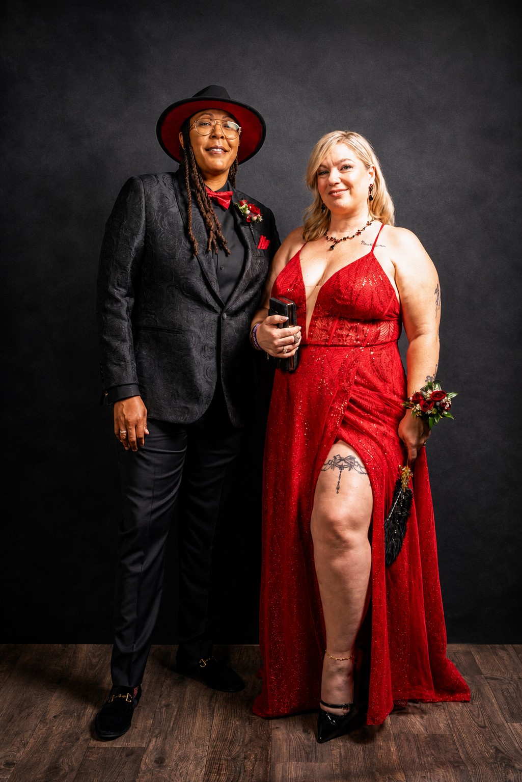 Couple dressed in formal attire posing at the Let's Do It Again Prom